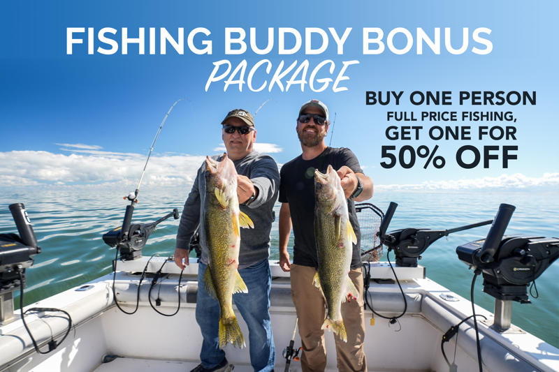 Two men holding large fish on boat