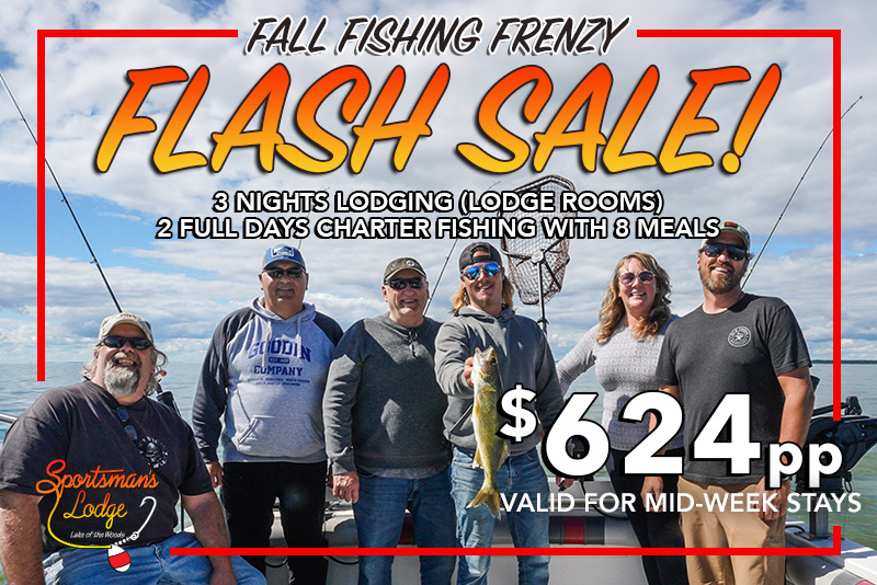 Group holding fish during fall fishing sale promotion